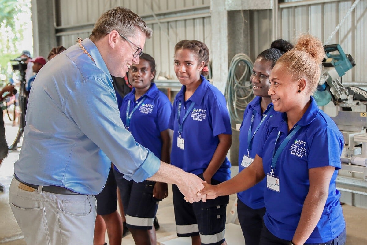 hon-pat-conroy-shares-a-light-moment-with-a-group-of-female-students-from-the-construction-course-at-the-aptc-campus