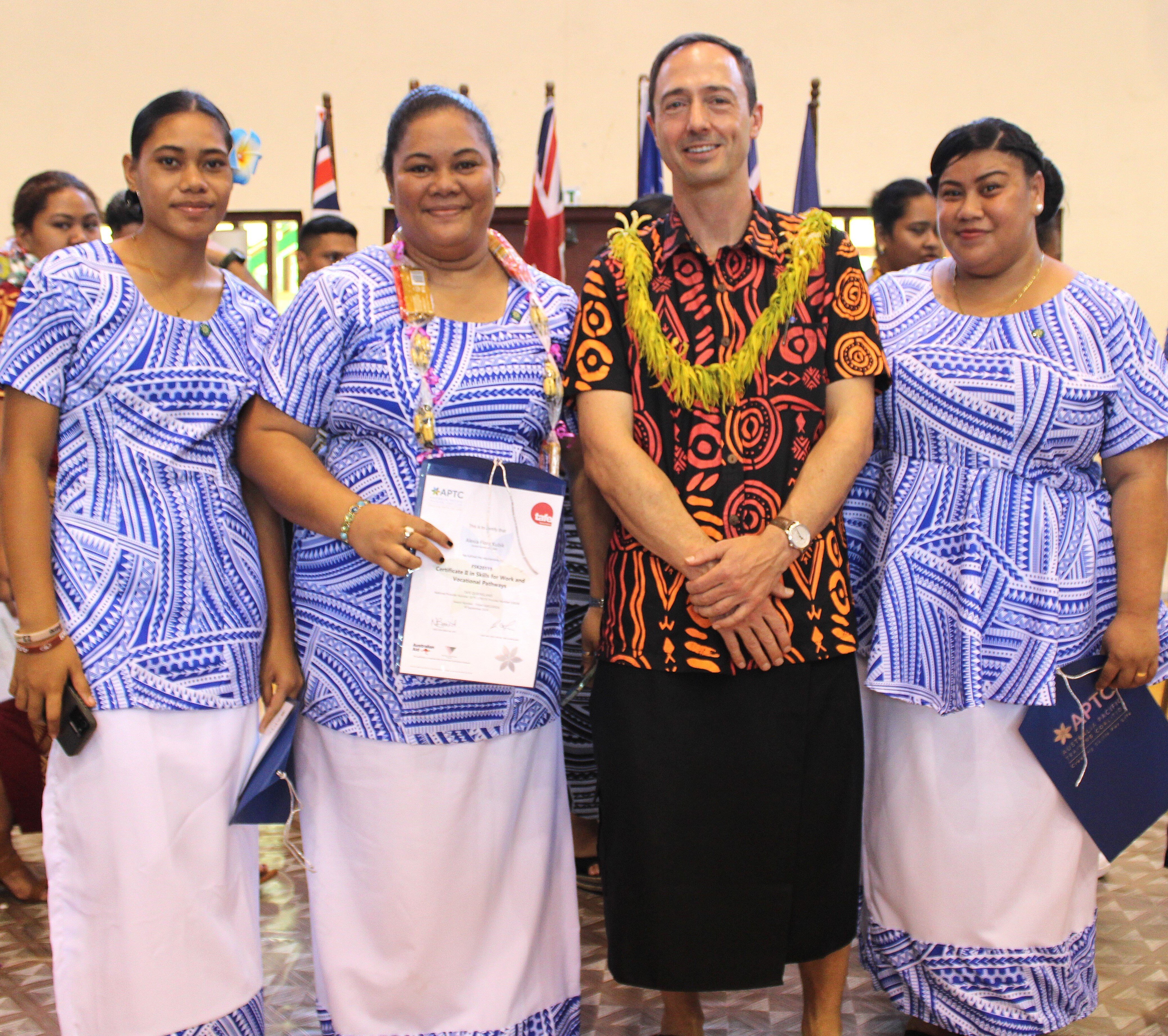 Photo 1 - HE William Robinson with three of the Certificate II in Skills for Work and Vocational Pathways graduates