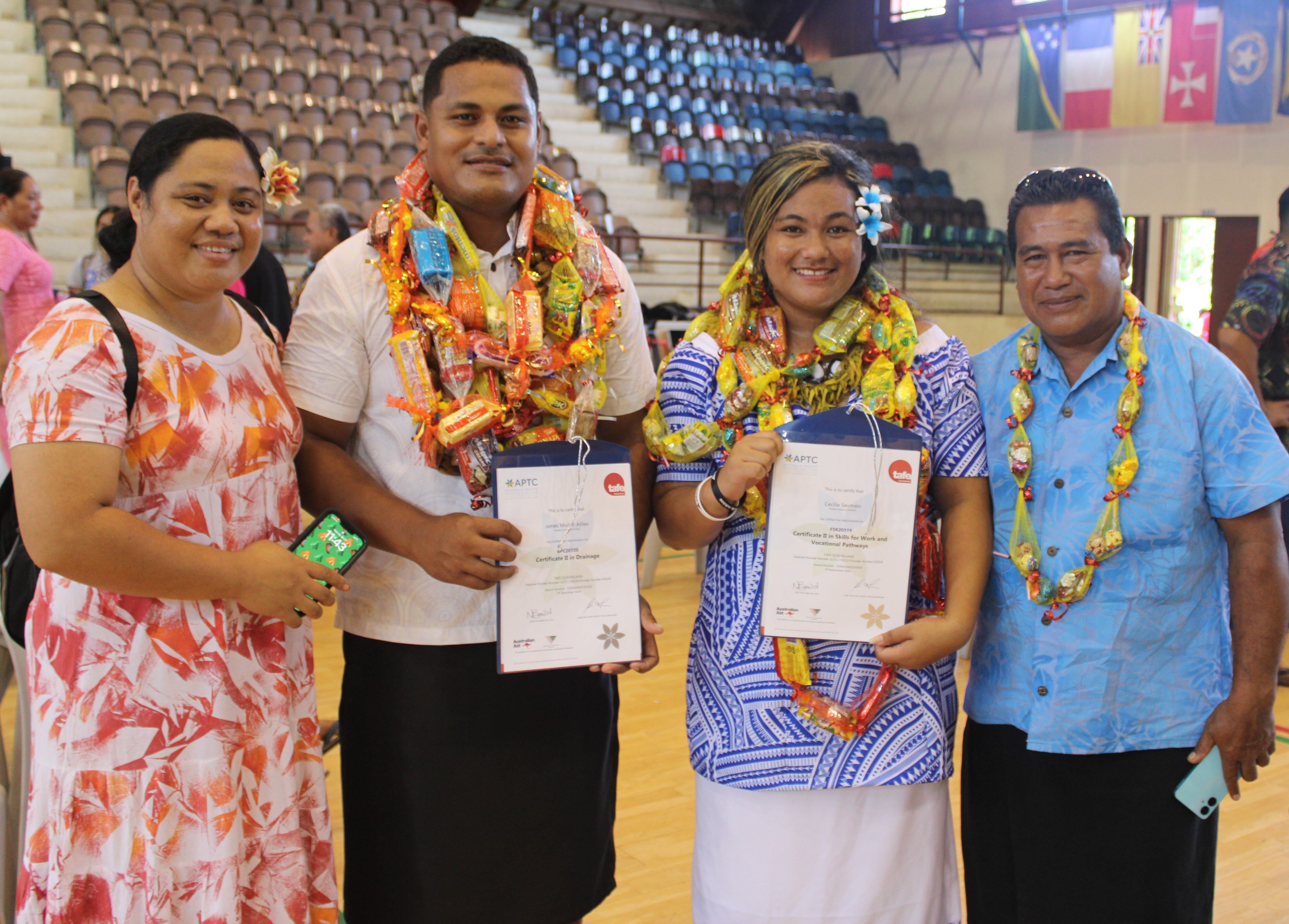 Photo 2 Graduates of Certificate II in Drainage (2nd from left) & Certificate II in Skills for Work and Vocational Pathways (2nd from right) with family