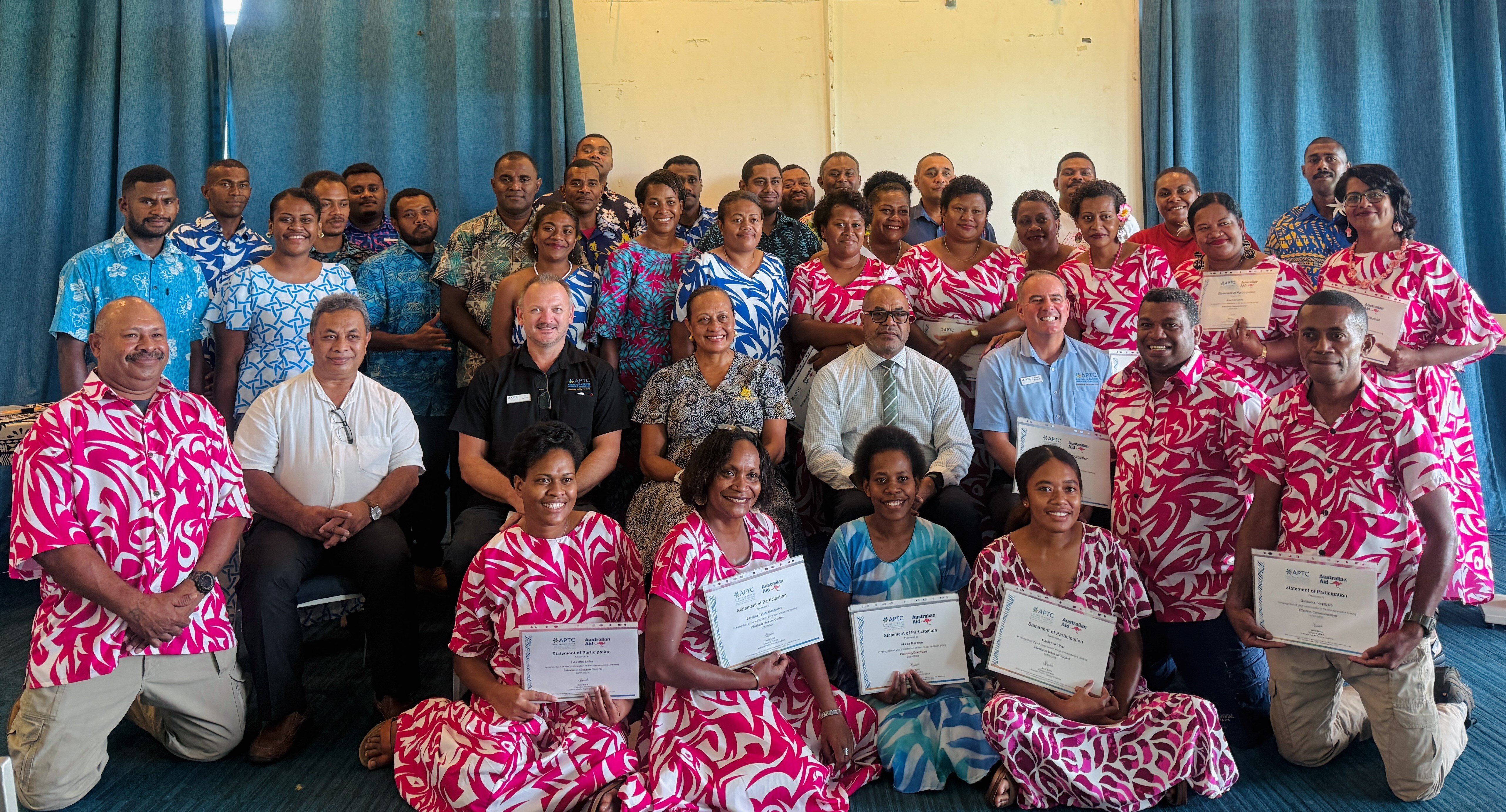 Photo 6 - Central division cohort with VIP guests during their certificate presentation