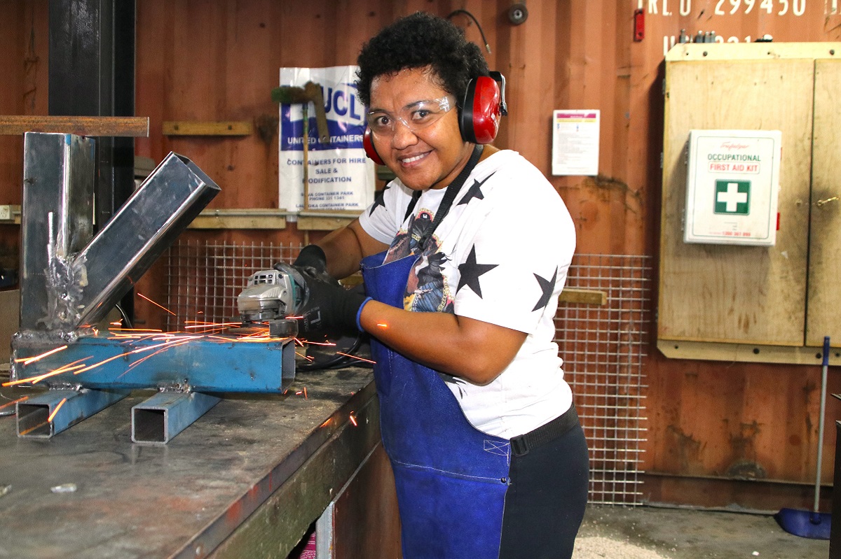 APTC alumna, Sisilia Seviua, applying her welding skills during the course. - Copy